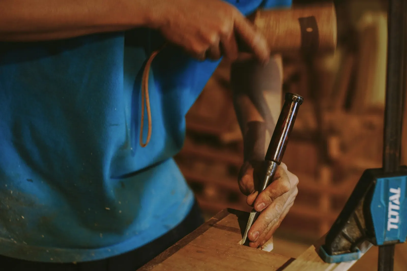 Hand woodworking — illustrative stock, not a staff portrait